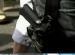 Protester with gun.