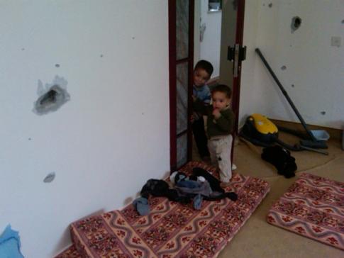 Ahmad Shafi's home was in the line of Israeli fire during the 2008/9 invasion. Note the walls damaged by gunshot.
